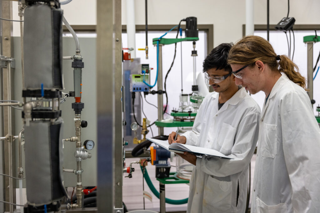 Researchers making observations at a Mohawk College lab