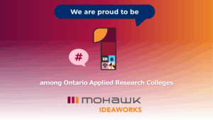 A gradient graphic with the text “We are proud to be” displayed in a blue speech bubble above a large number one icon decorated with small research-themed symbols. Below it reads “among Ontario Applied Research Colleges.” The Mohawk IDEAWORKS logo appears at the bottom.