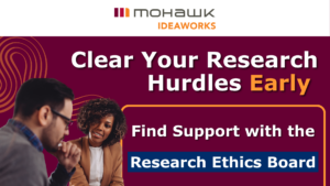 Mohawk IDEAWORKS promotional graphic with a maroon background and gold accents. On the left, two researchers review notes together at a table. On the right, bold white and gold text reads: "Clear Your Research Hurdles Early," followed by a box containing the text "Find Support with the Research Ethics Board." The Mohawk IDEAWORKS logo appears at the top center.